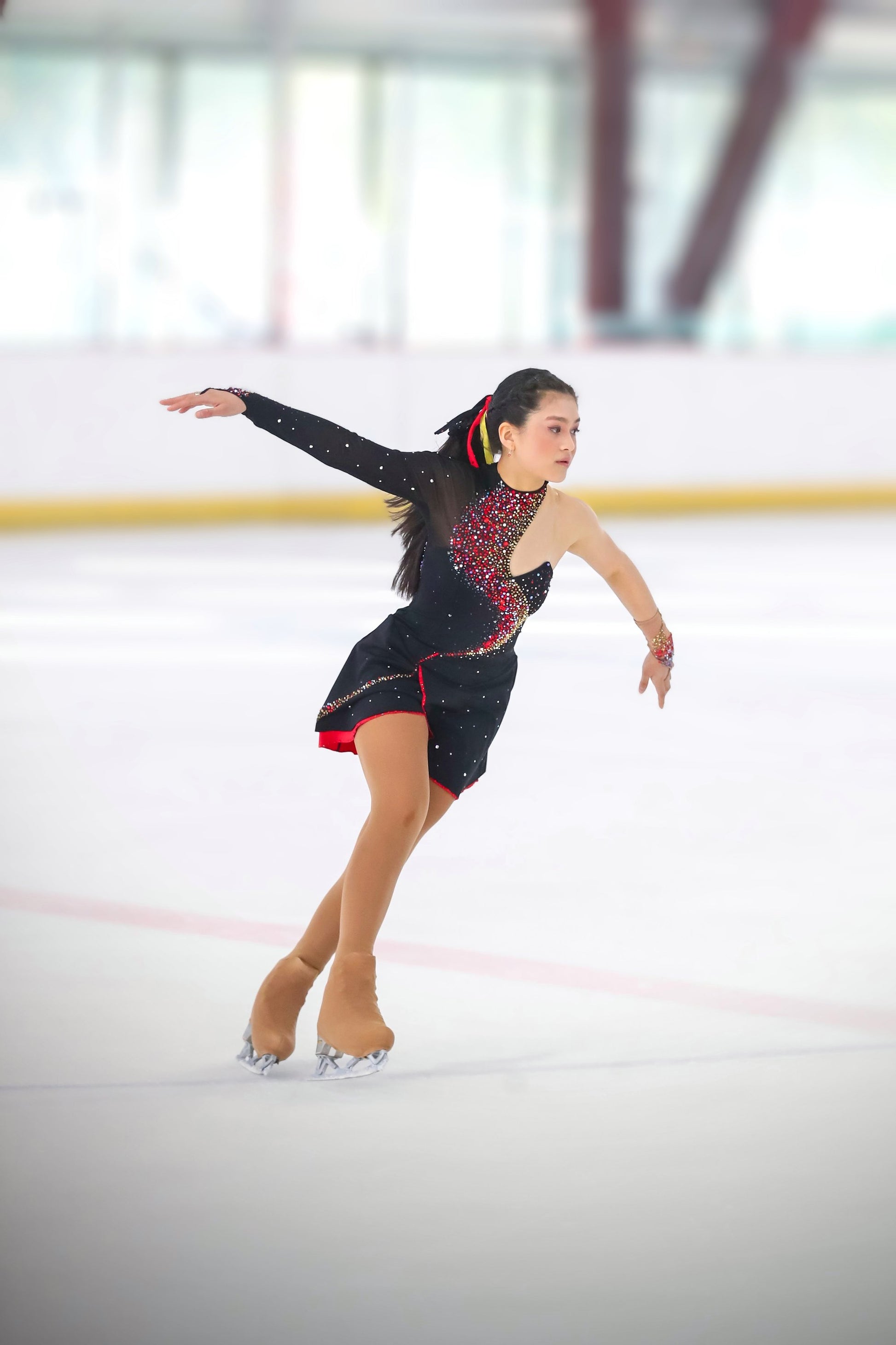 Black fire rhinestone figure skating competition dress performance on ice